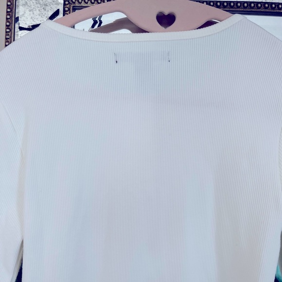 Size M fits more like a small, long, fitted cream color with gold metal snaps - Picture 8 of 15